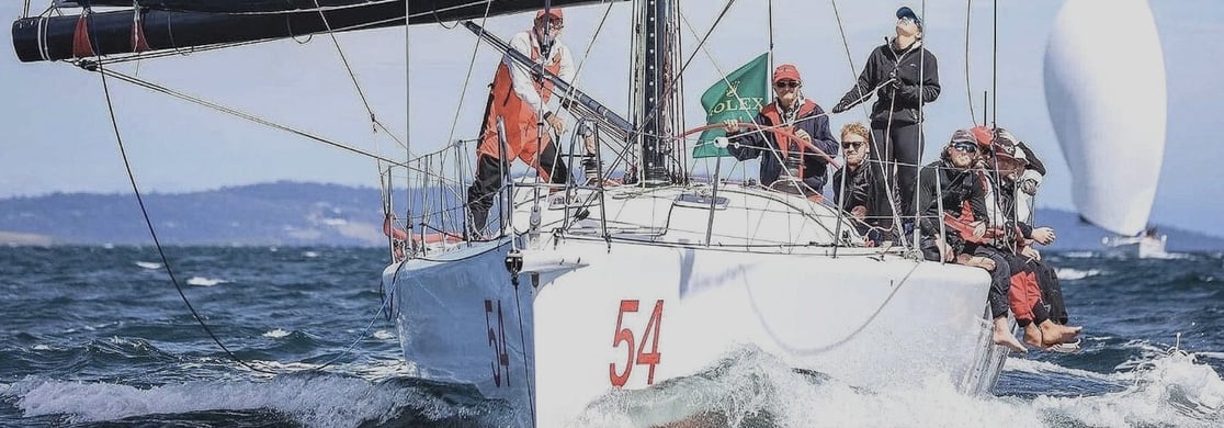 RICHARD HUDSON ON HIS YACHT PRETTY WORMAN racing